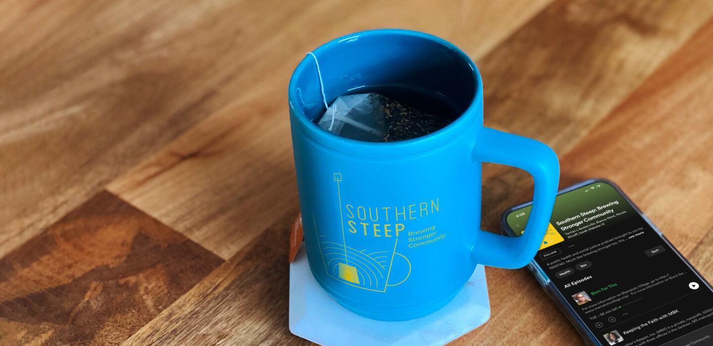 A Southern Steep coffee mug on a table.