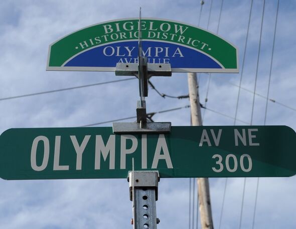 Street sign for Olympia Ave NE in Washington.