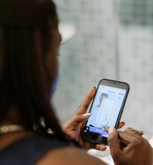 Woman browsing the TTMH site on her phone