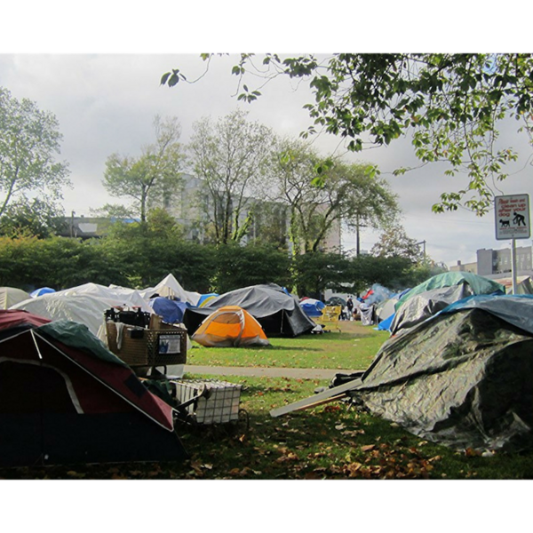 Camping gear in a city park.