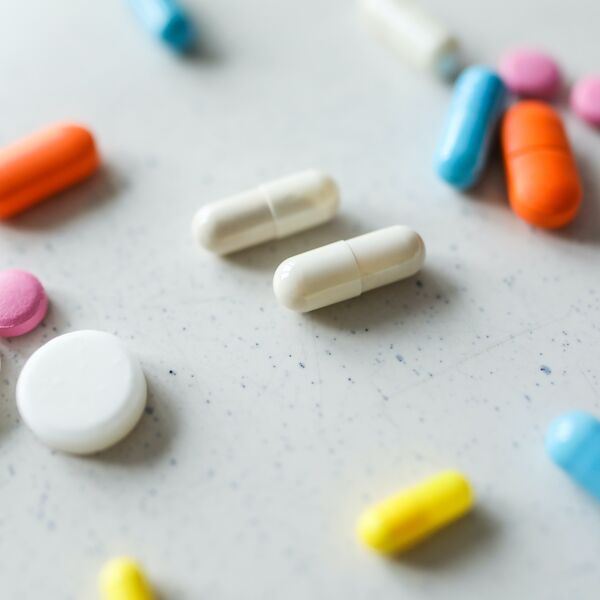 A collection of pills on a table.