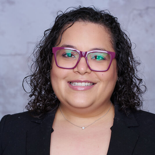 Professional headshot of Kristina