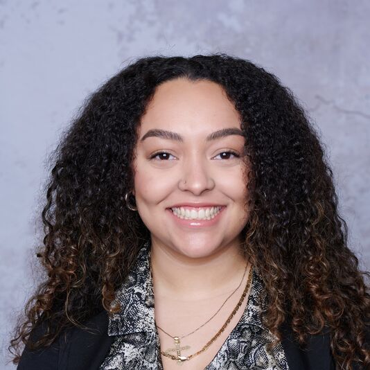 Professional headshot of Meredith