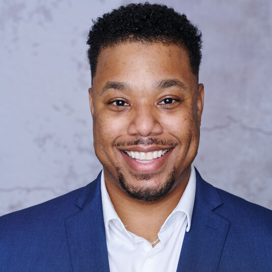 Professional headshot of Christopher